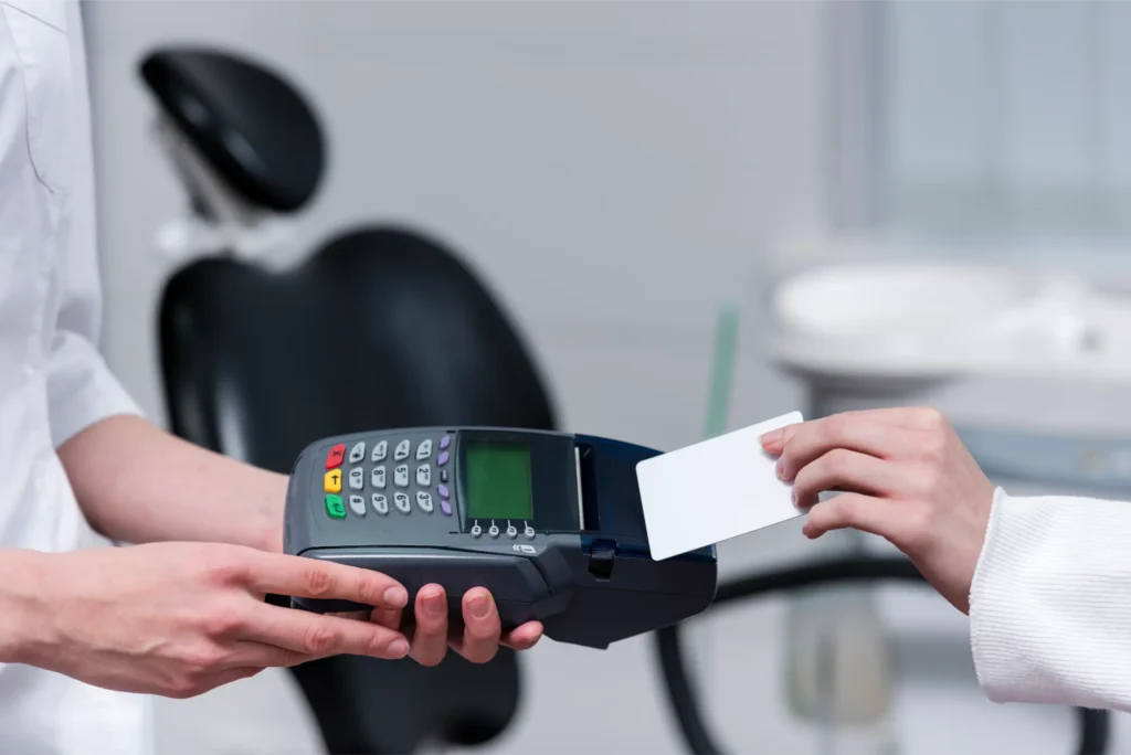 patieant-paying-dental-treatment-with-credit-card